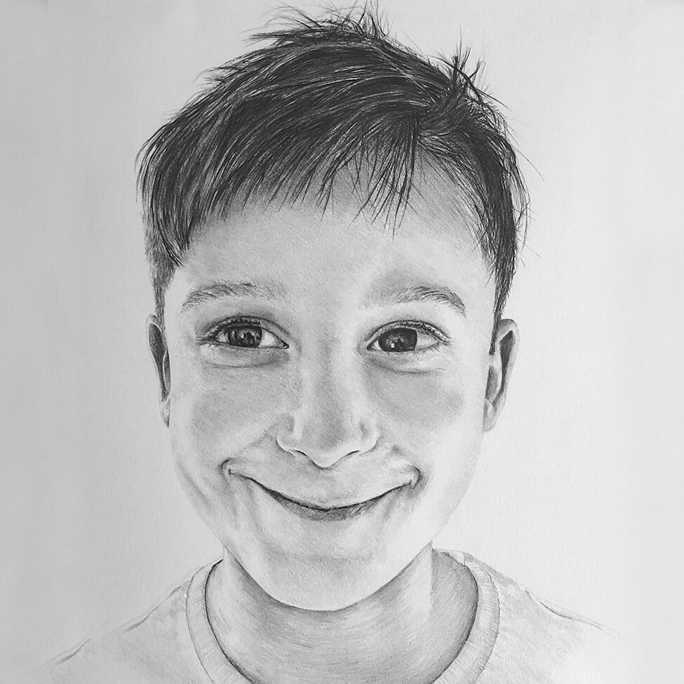 headshot of child portrait in black and white graphite pencil